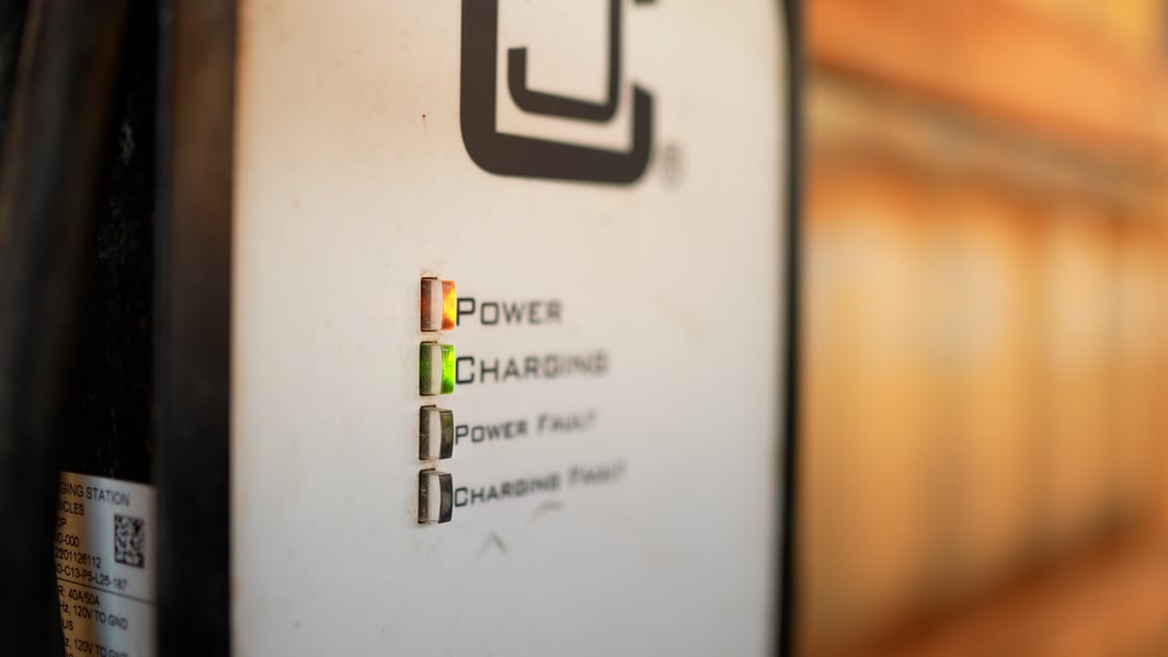 Close up of EV charger with red 